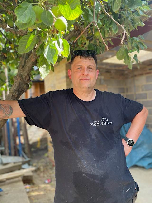 Decobuild staff member in a black tshirt